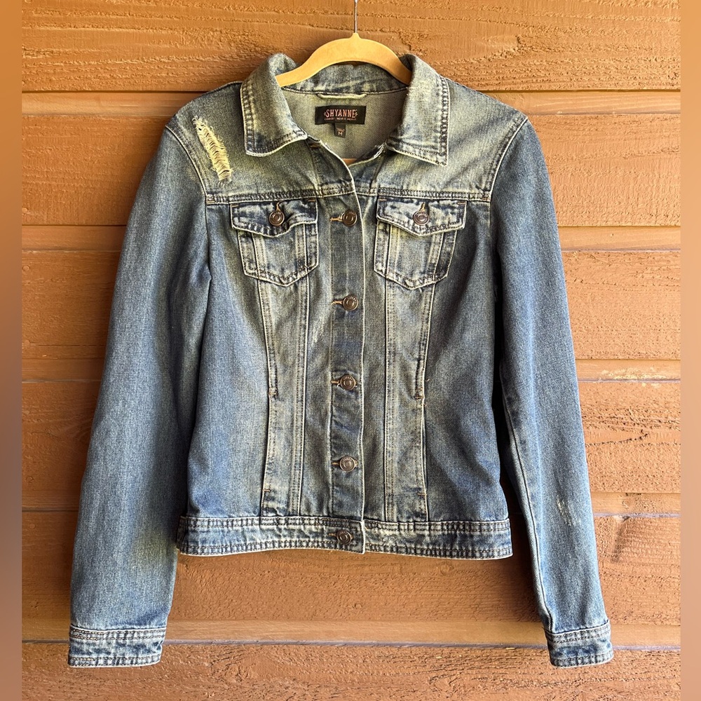 Shyanne women’s blue jean jacket. Faded and distressed. 
NWT size M